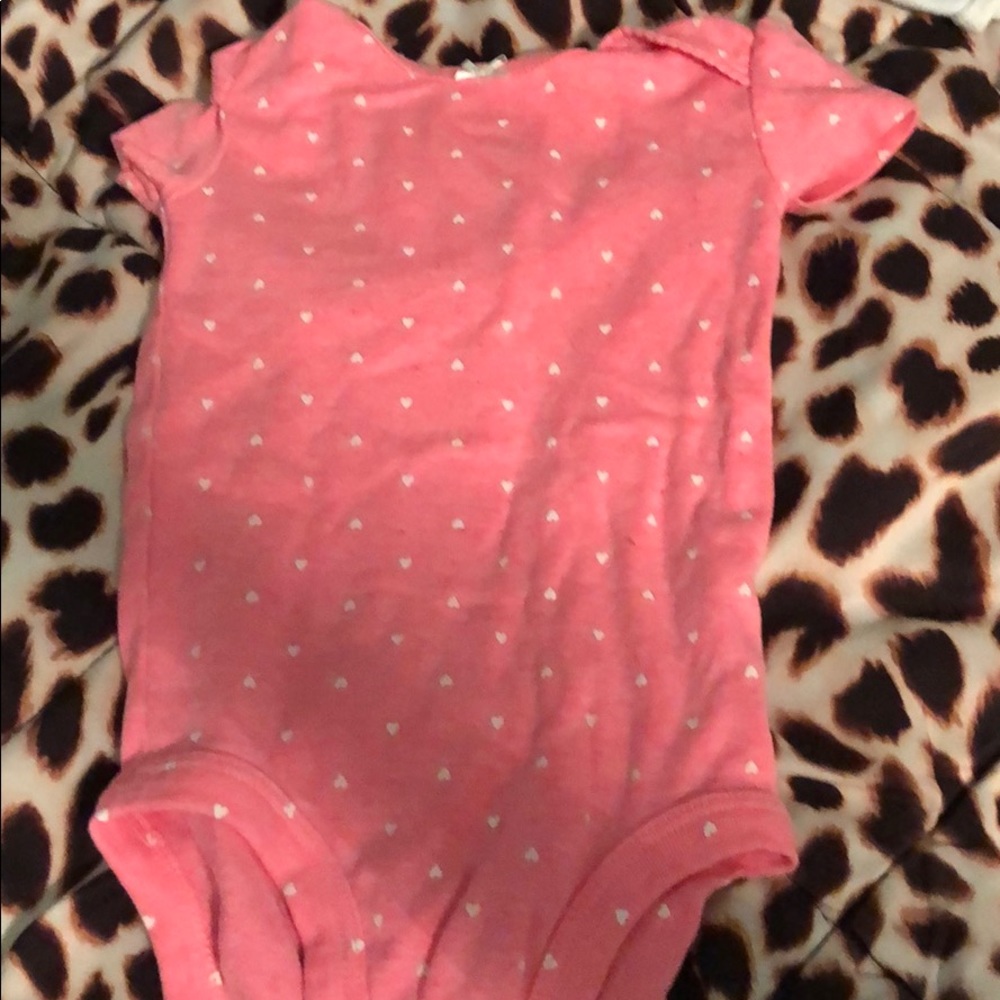 Short sleeve pink onesie with white hearts